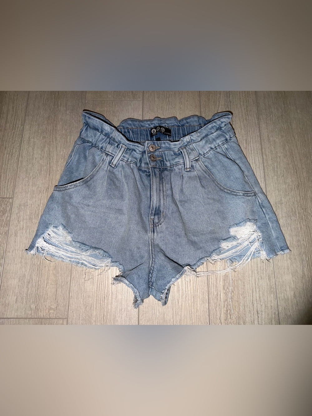 High-Rise Light Blue Paperbag Denim Shorts with Frayed Hem